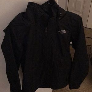 Never before worn north face raincoat with hood